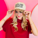 Zenana Leopard print cap with “He Still Does Miracles” embroidered on the front.