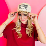 Zenana Leopard print cap with “He Still Does Miracles” embroidered on the front.