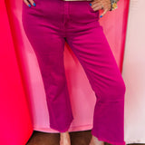 Zenana magenta cropped bootcut jeans with frayed hem and stretch fit.