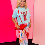 Pink and white striped pants with red lobster and blue sand dollar shell print, lightweight and flowy fit