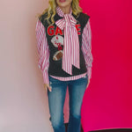 Video of Red and white stripe tie front blouse.