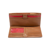 Hammitt 110 North mahogany luxury leather folding wallet with a magnetic closure, red accents and gold hardware.