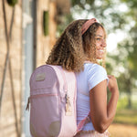 Jon Hart Backpack with coated canvas, natural leather trim, and spacious compartments for stylish everyday or travel use.